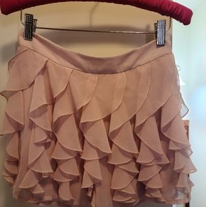 Blush ruffle mini skirt